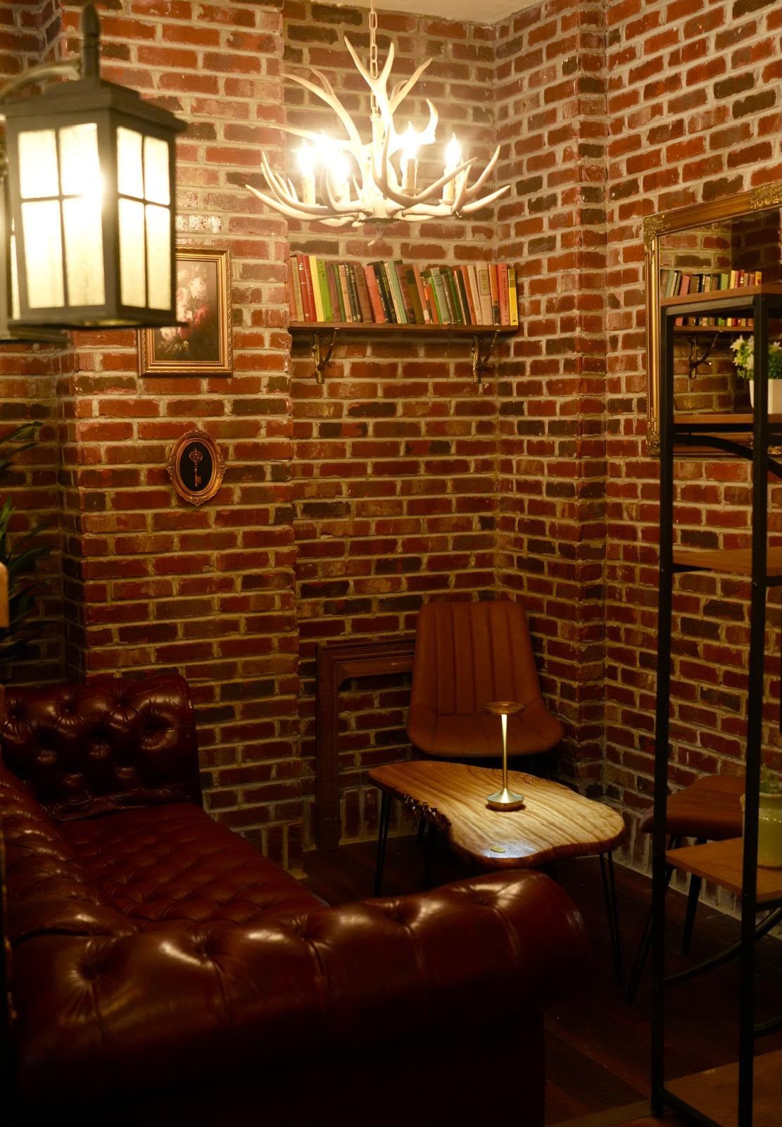 Cosy brick alcove seating at Books N' Cup Manhattan